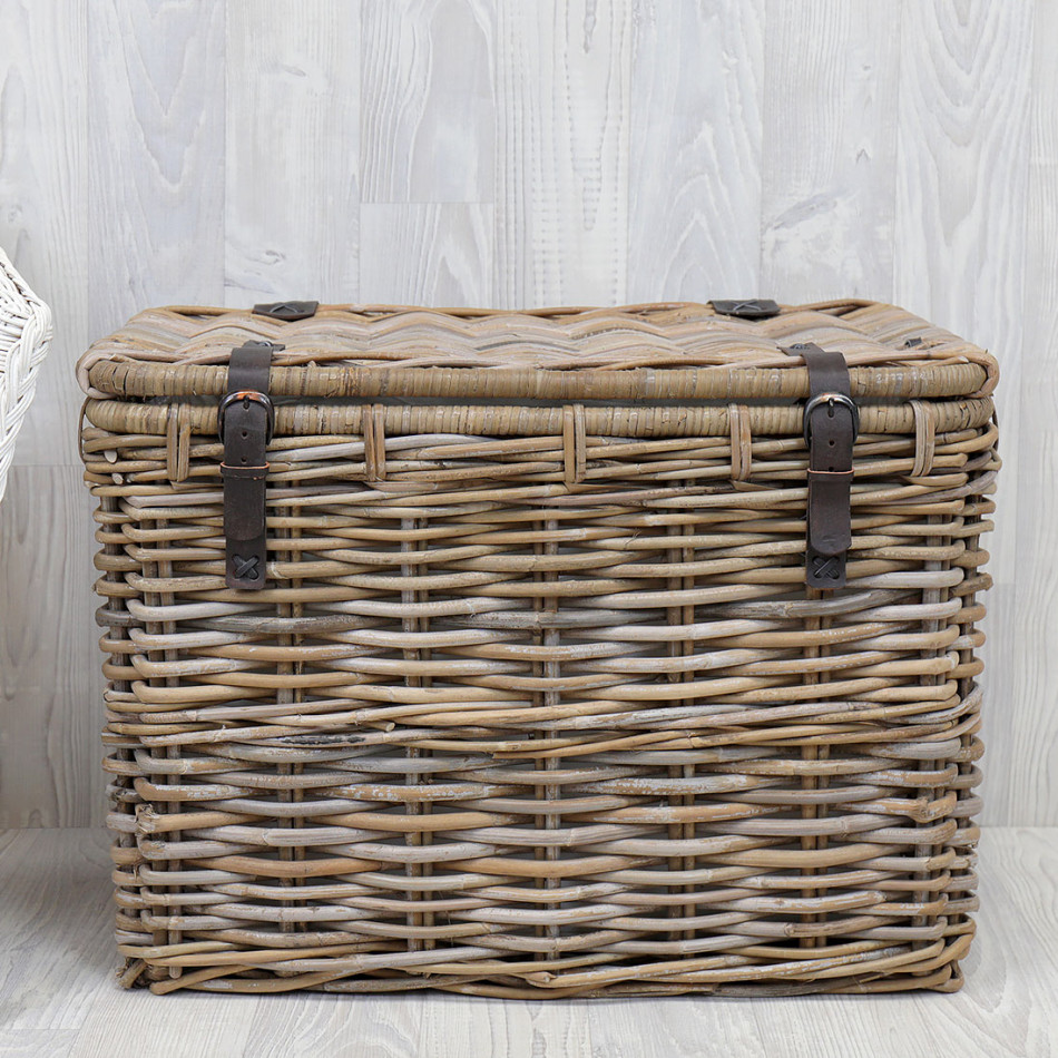 Closed Rochester antique grey rattan storage trunk with brown leather buckle straps