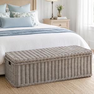 St Alban long greywash rattan trunk at the foot of a bed