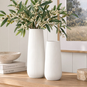 Zahra white ribbed vases styled with olive stems on a timber console beside a bowl and framed artwork