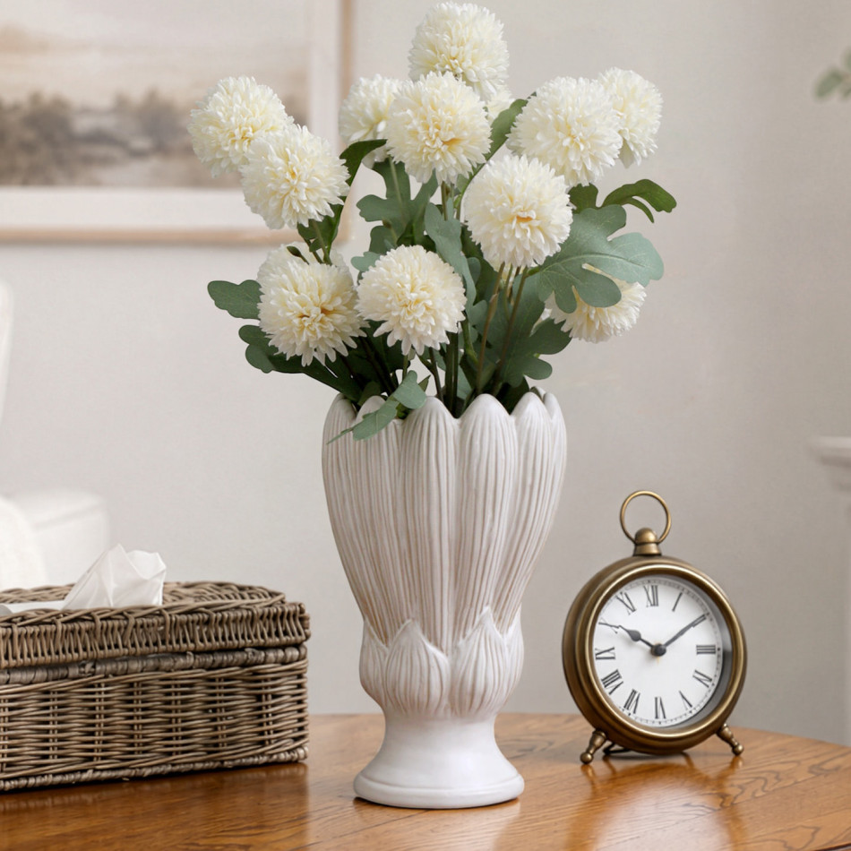 Amarante cream petal vase styled with white flowers and greenery on a timber table