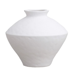 Wide white matt angular ceramic vase styled beside a taller matching vase with eucalyptus and two turned wooden candle holders.