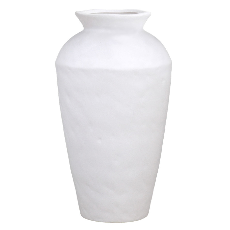 Tall angular matt white ceramic vase with eucalyptus styled with natural wood candleholders and books.