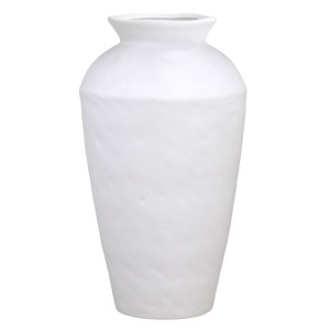 Tall angular matt white ceramic vase with eucalyptus styled with natural wood candleholders and books.