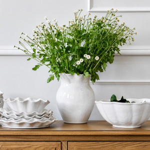 Colombine White Rope Vase styled with white flowers among coordinating ceramic serving pieces
